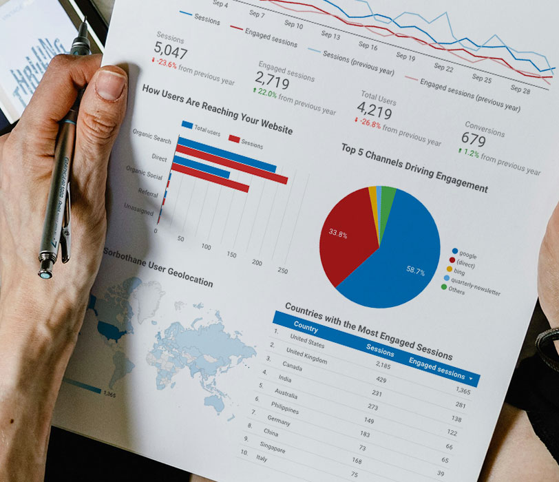 man studying graphs and charts